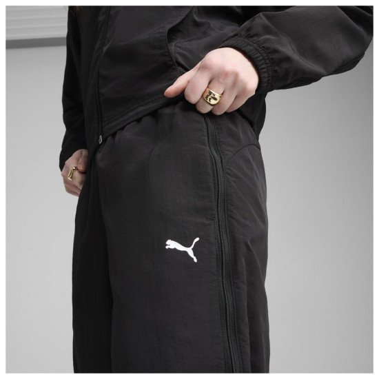 Puma Γυναικείο παντελόνι φόρμας Dare to Relaxed Woven Zip-Off Pants